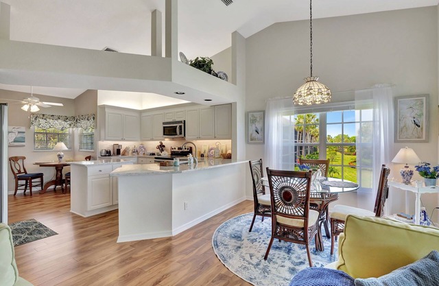 Lake and Golf Course Views From This Corner Unit!