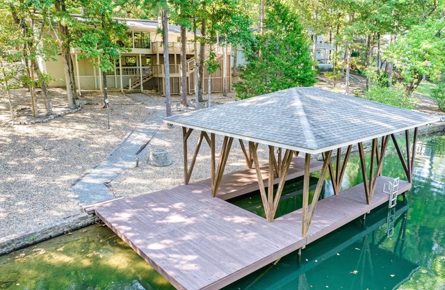 Lake Cortez Lakefront Sleeps 10 in Hot Springs Village featuring 8 Golf Courses