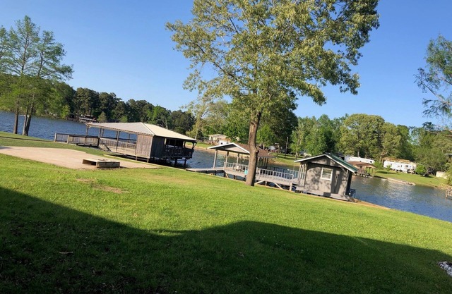 Lake front home in secluded neighborhood mins away f/ boat launch and amenities.