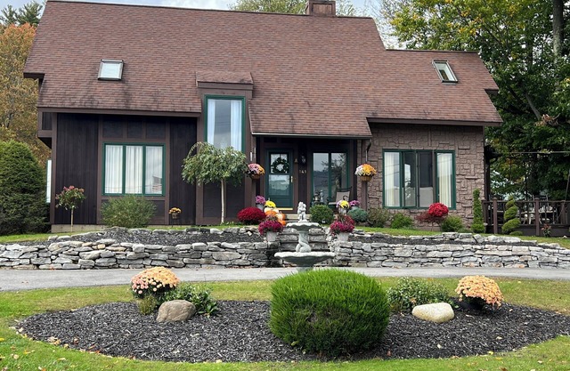 Lake House With Dock in premier neighborhood on Assembly Point in Harris Bay.