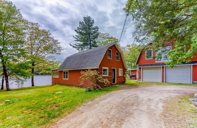 Lakefront cabin with private dock, wood stove, firepit, deck, & grill - 1 dog ok