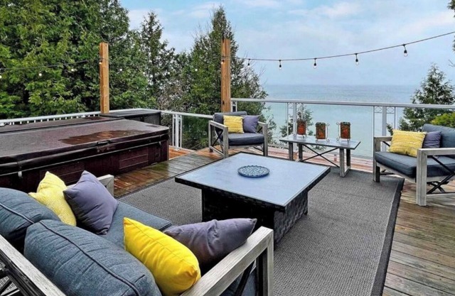 Lakefront Cottage w/Hot Tub, BBQ Grill, Patio, Fire Pit, Dock, Sauna, Fire Place