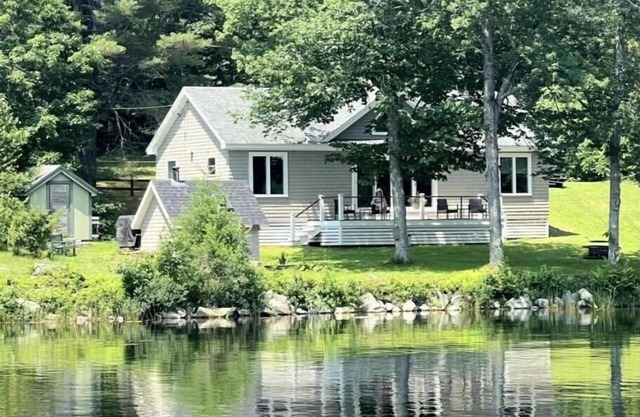 Lakefront Cottage with sauna and private dock.