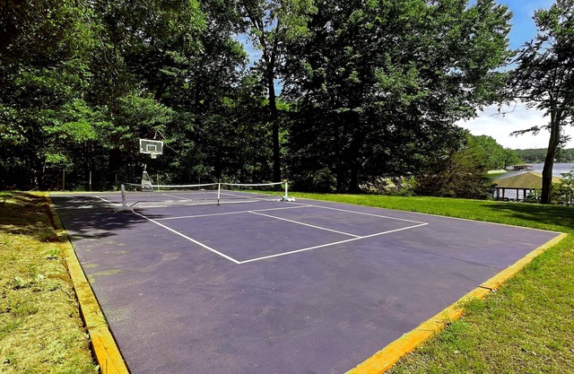Lakefront home in private location with dock, firepit, game room & Pickleball