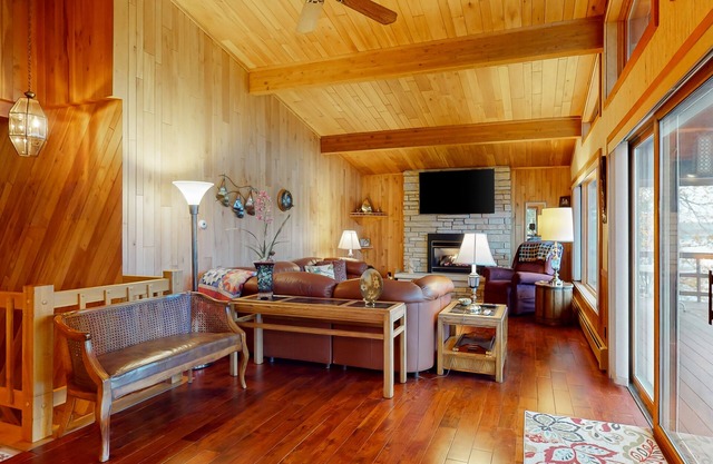 Lakefront home on South Two Lakes with lake views, lake access, firepit, & dock