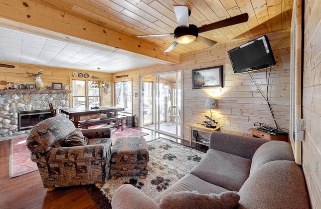 Lakefront home with dock, swimming area, & wood stove - sunset views