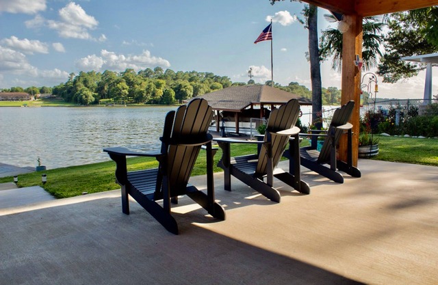 Lakefront home with private dock, hot tub, double kayak, boat ramp, & lake views