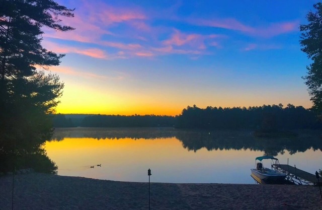 Lakefront Home with Walk-Out Sandy Beach!