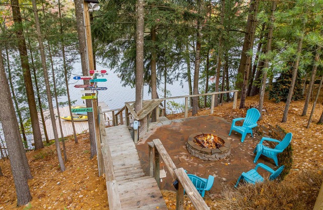 Lakefront retreat 30 min to Traverse City. Hot tub, fire pit, kayaks, game room.