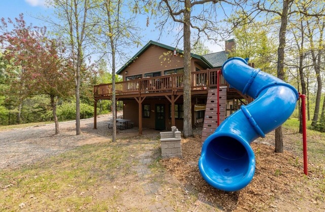 Lakefront retreat on Island Lake. Two cabins, 7 bedrooms, sand beach, privacy+++