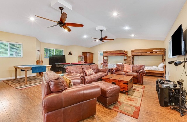 Lakefront retreat with kayaks, canoe, game tables, children's items, and W/D