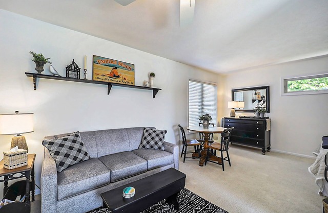 Lakefront studio with lake & beach views, deck, firepit, beach access, & WiFi