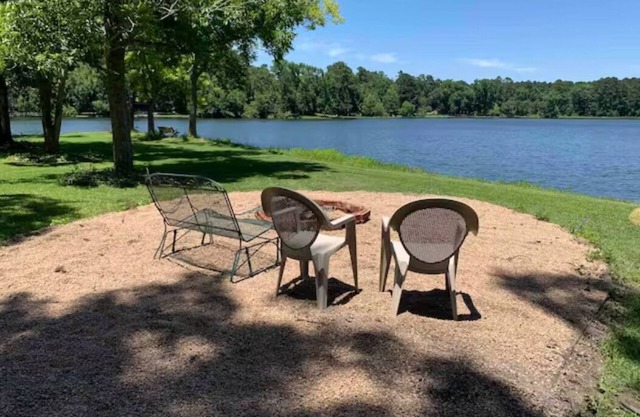 Lakehouse on a small private lake situated on 1.2 acres of lakefront property.