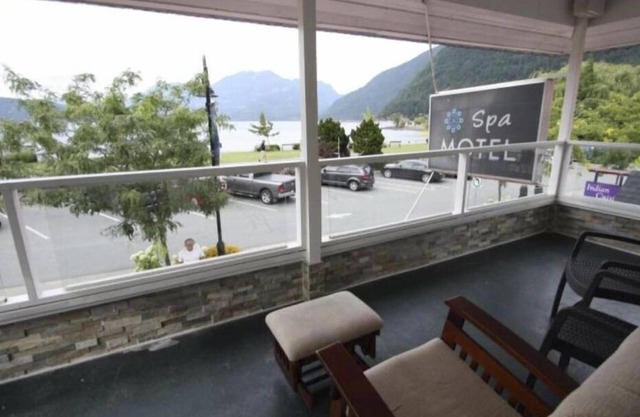 lakeside bedroom and a living area with stunning views of Harrison Lake