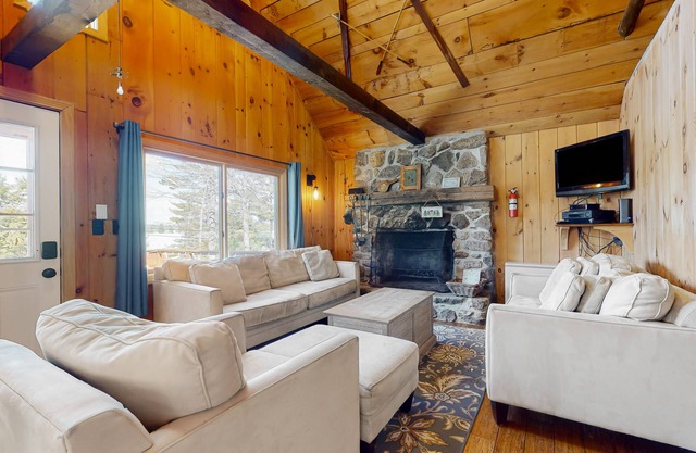 Lakeside home with water views, firepit, deck, & W/D - dog-friendly