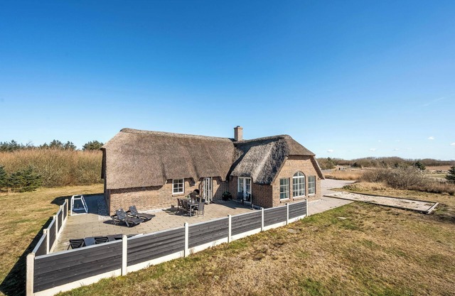 Large 16-person holiday home with pool, hot tub and sauna.