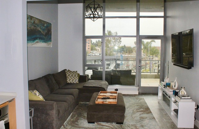 Large and Bright Downtown Condo W/ 400 sq ft. of outdoor living space + Parking