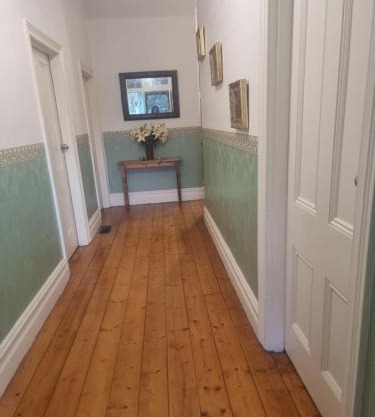 Large bedroom with twin beds and private bathroom