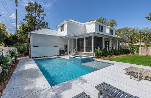 Large family home with private pool and short walk to beach.