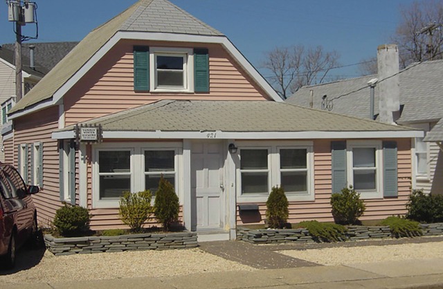 Large home two floors with upper deck area.