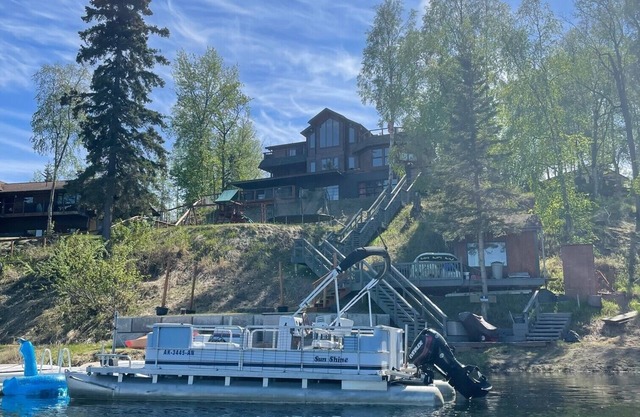 Large luxurious lakefront home with water toys & mountain view