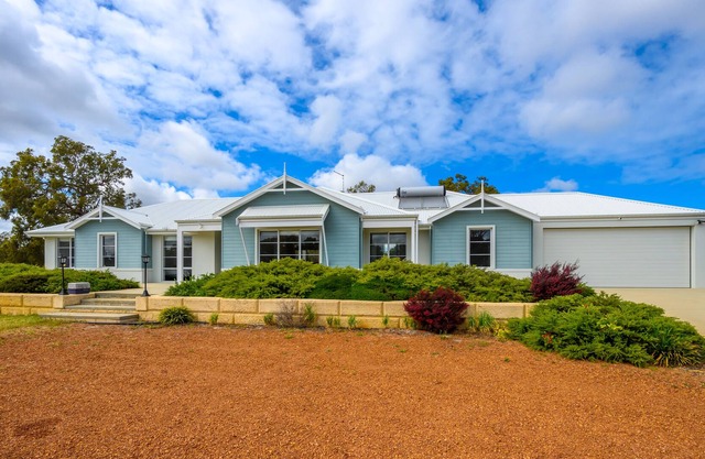 Large luxury home in tranquility on a 100 acre land