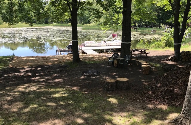 Large waterfront house on quiet canal of all-sport Eight Point Lake