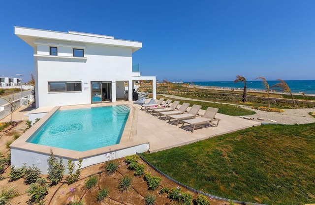 Larnaca Blue 1 is a modern villa in an exclusive residential complex of 20 villas with the sea at yo
