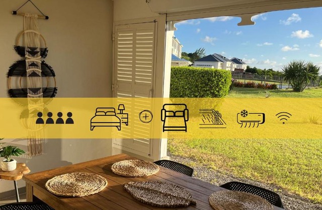 Le Baileys - Spacieux appartement en rez-de-jardin vue lagon