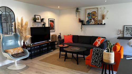 Le cosy avec climatisation, terrasse et parking privatif