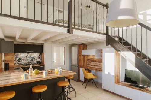 Le Joyau : loft historique et arboré, centre-ville