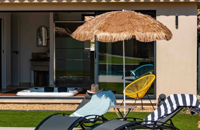 Le Mimosa apartment with private terrace on garden level, a stone's throw from the village.
