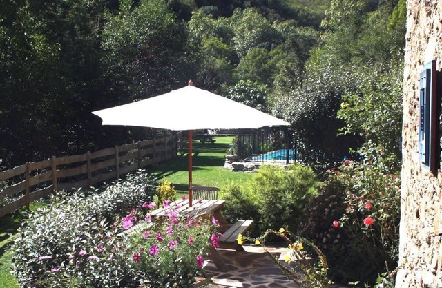 Le Pommier, a tranquil retreat with pool in its own valley 30 miles from the sea