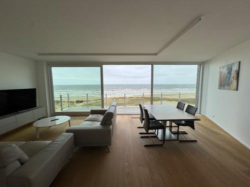Le Zilt Appartement rénové deux chambres vue mer et dune avec parking privé à La Panne by La Conciergerie
