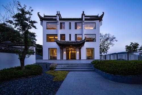 Leisure Haven (Tachuan) Hotel