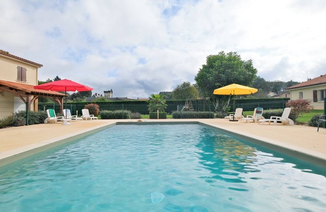 Casa de vacaciones 'L'Enclos Avec Piscine Et Clim' con piscina compartida y aire acondicionado