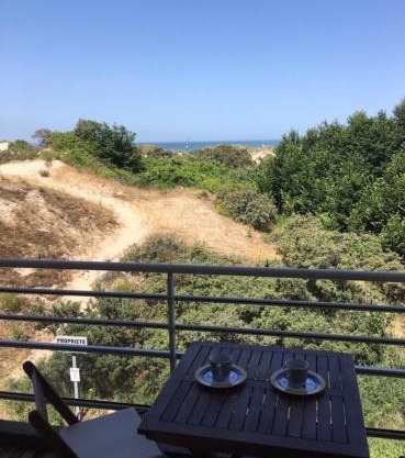 Les pieds dans le sable