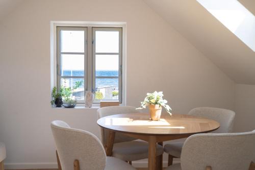 Lille villa med havudsigt og privat sauna