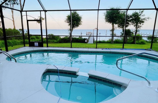 Lily’s Escaped, Private screen cover pool, fishing dock,