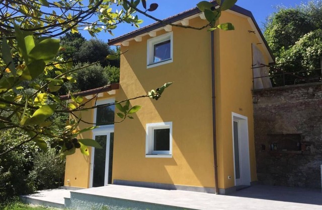 Little house in the garden of period villa in La Foce, La Spezia.