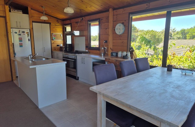 Lockwood holiday house, nestled among lush trees.