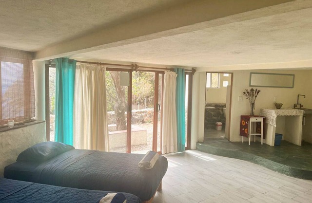 Loft en la montaña con baño privado, terraza, jardín y vistas panorámicas.