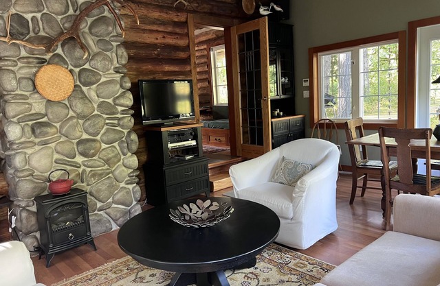 Log Cabin on River Acreage