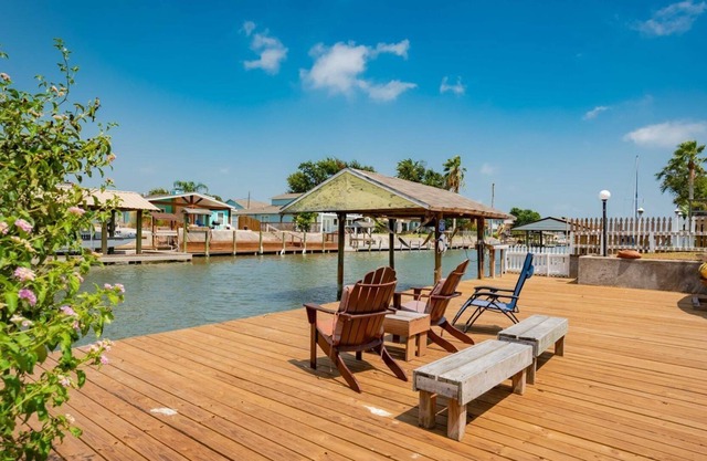 Lovely coastal home on a deep canal near Estes Flats!