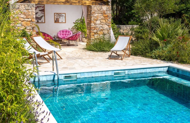 Encantadora cabaña con jardín
