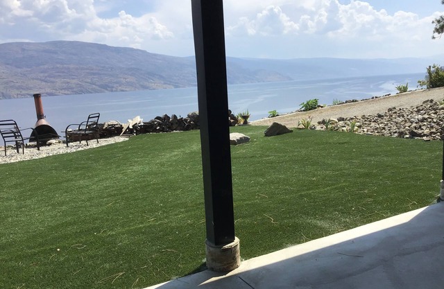 Lovely ground level suite, private lakefront home. Beautiful grounds. Great view