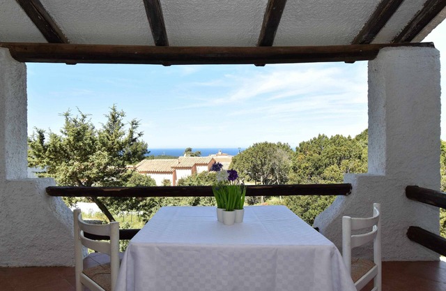 Encantadora villa con vista al mar en residencia con piscina