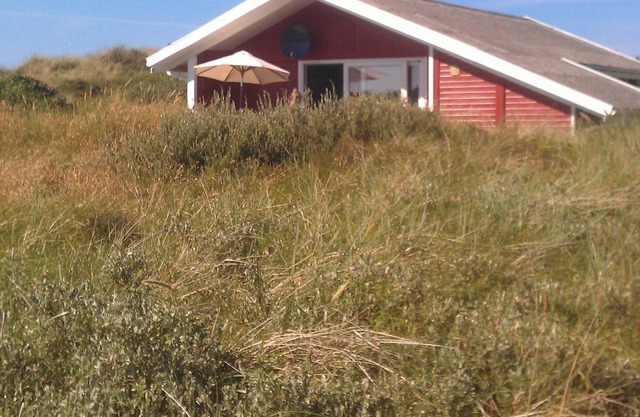 Encantadora casa de madera en una hermosa ubicación, cerca de la playa, las dunas y el bosque