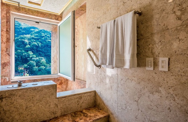 Luna Suite With two King Size Beds, With Walk out Terrace Overlooking the Beach
