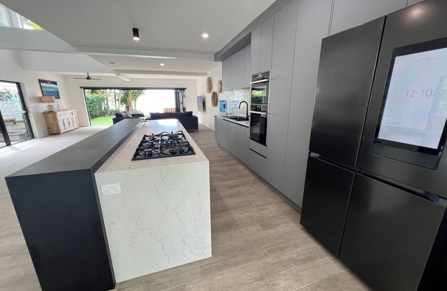 LUX HC Waters Edge Presents our exquisite beachfront house in Holloways Beach